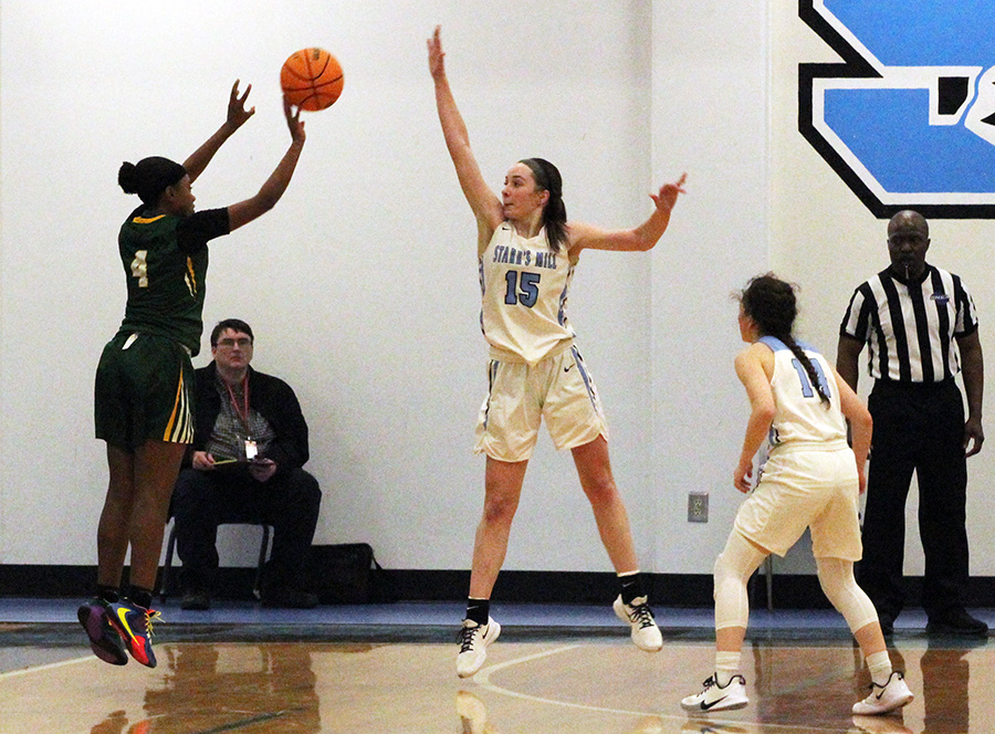 Senior Alice Anne Hudson goes up to block a shot during the region championship game against the Griffin Lady Bears in the Panther Pit. The Lady Panthers outlasted Griffin in the 47-38 victory. Hudson led the team in scoring with 18 points. All of the starting five for Starr’s Mill scored in the game.