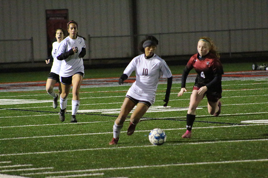 Junior Sara Evans looks to get the ball down the field. Evans scored both goals for the Lady Panthers and was the driving force on offense in the 2-1 win.