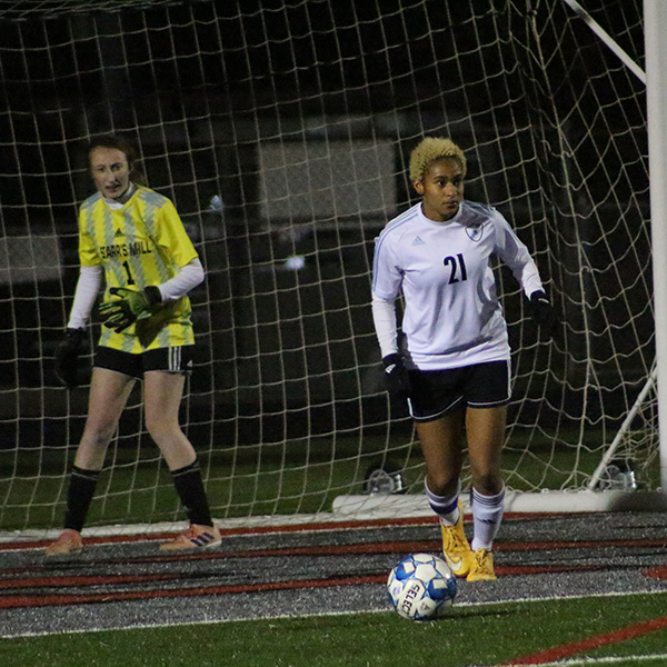 Senior Chloe Spradlin directs her teammates before she kicks the ball down the field. Spradlin and the rest of the Lady Panther defense held the Wildcats to just one goal. She also had one assist to junior Sara Evans.