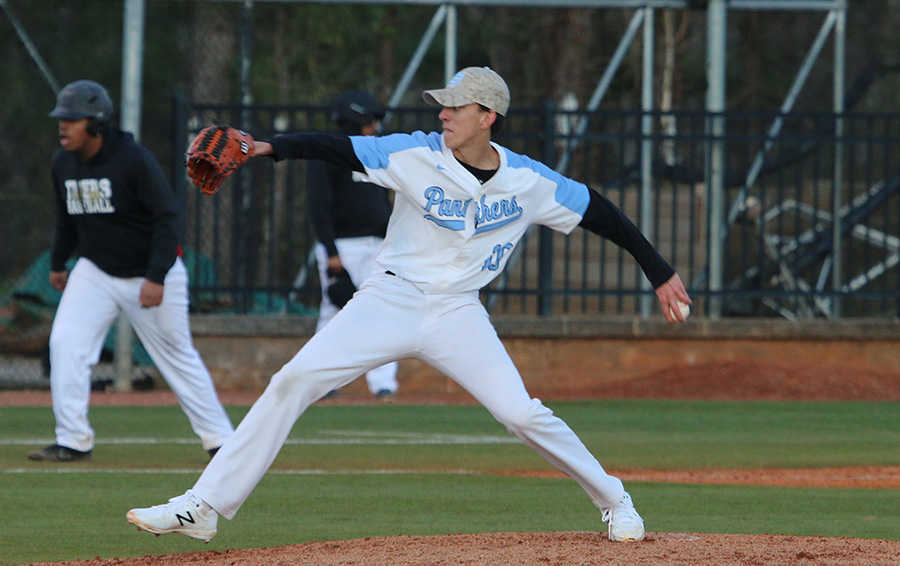 Junior Declan Dunn steps forward for a pitch during the final game of the Panthers’ series against the Fayette County Tigers last Thursday. Starr’s Mill baseball has showed great promise early on this season with dominating performances and a 6-3 record. However, there have been a few struggles that have plagued the team early on this season, most notably losing their top starting pitcher, junior Eli Jones. 