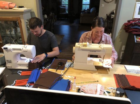 Whitewater Middle School special education teacher Sherri Dickinson (right) and her son Justin (left) sew masks to help those working in the local community. Since schools were shut down, she has formed Fayette County Mask Makers consisting of over 350 members. Together they have produced over 6,500 masks and distributed them to various essential workers around Fayette County.