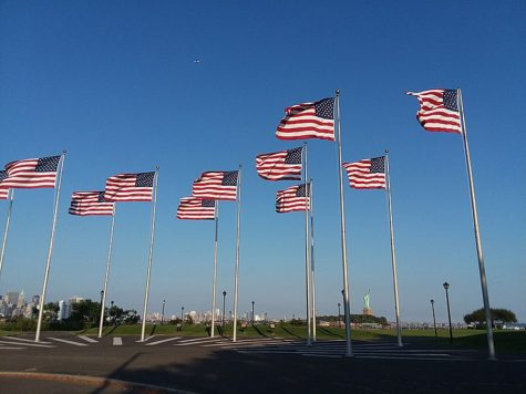 Multiple flags hoisted across an empty public space. The Coronavirus outbreak has led to situations that people of the current generation could never have imagined. However, there are many reasons to believe in what we are doing is for the best. Our American pride is more evident now than it has been in a long time.