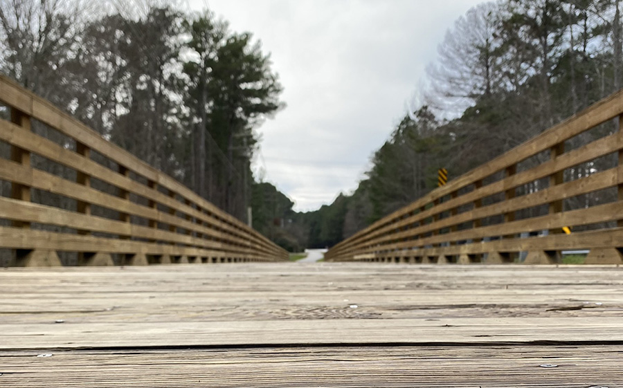 Located on Woodcreek Lane, the Woodcreek bridge was built to allow easier access to golf cart paths.