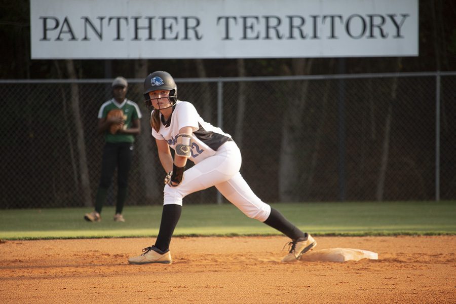 Panther alumnae Paige Andrews (class of 2020) aboard second base awaiting the next hit. Replacing last year’s seniors is not the biggest challenge facing softball and the rest of the fall sports teams. The biggest question relates to COVID-19 and if teams will even have a season. 