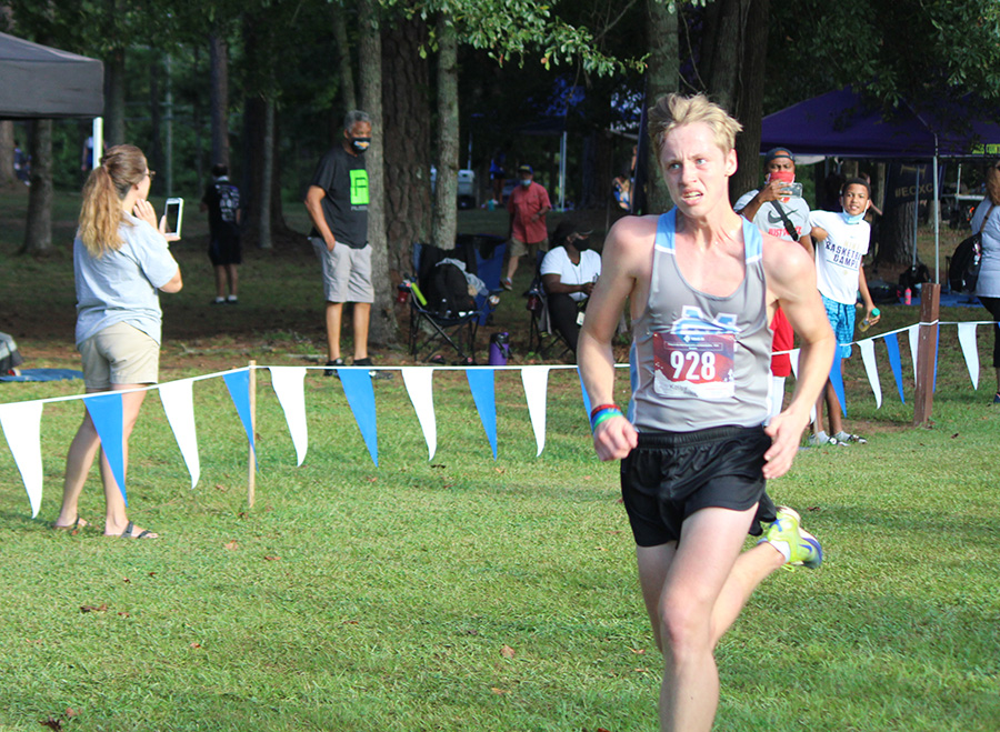 Senior Kolby Smith approaches the finish line on the One Church 5k course. Starr’s Mill hosted the 9th Annual AT&T Panther Invitational meet, where over 40 high school teams across the state came to compete. The varsity boys’ team placed eighth while the varsity girls placed sixth. “Not our best performance, but there were some highlights,” Smith said. 