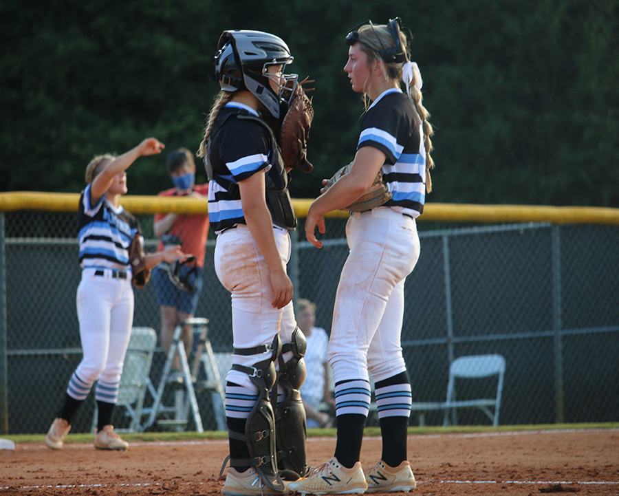 Junior+catcher+Ashley+Sikes+%28left%29+and+junior+pitcher+Lilli+Backes+%28right%29+converse+with+each+other+during+game+one+of+their+double+header+at+Whitewater+versus+the+Lady+Wildcats.+In+an+atypical+performance+from+Starrs+Mill%2C+the+Lady+Panthers+staggered+and+stumbled+in+a+2-0+sweep.+The+loss+puts+them+out+of+the+top+four+teams+in+the+region%2C+putting+their+postseason+contention+in+jeopardy+in+what+is+a+new+low+for+Starr%E2%80%99s+Mill.+Through+the+double+header%2C+Backes+gave+up+16+runs+in+an+unusual+performance+from+the+star+pitcher.