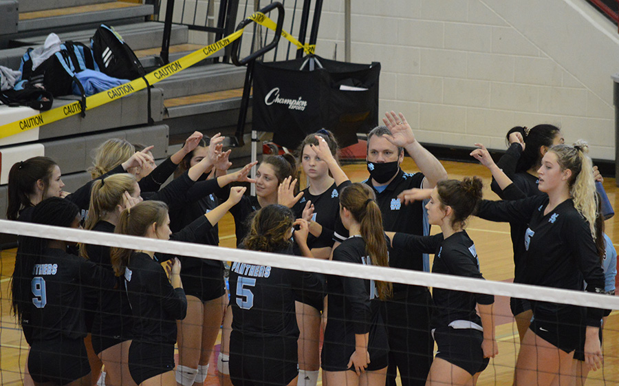 Lady Panthers gather together after a timeout. Starr’s Mill entered the region tournament the no. 6 seed, but made their way into the region’s top four in order to qualify for the state playoffs. The Panthers defeated Woodward Academy 3-1 in the first round.