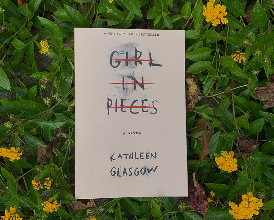 “Girl in Pieces” by Kathleen Glasgow is a mental-health oriented novel depicting a teen struggling with self-harm and depression. A roller coaster of a plot, this book is recommended to anyone who loves a raw story. 