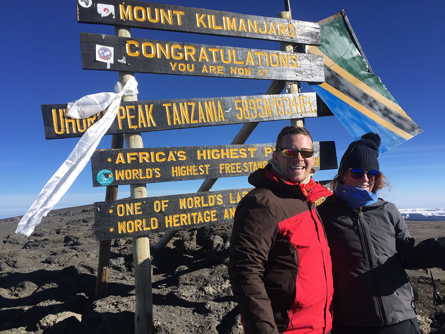 Starr’s Mill alum Glenn Goorsky pictured with his high school sweetheart, Rachel Taylor, who is now his wife, at the top of Mt. Kilimanjaro. Goorsky, while successfully pursuing and implementing a football leadership program for the Panthers, continues his love of travel with his job. 