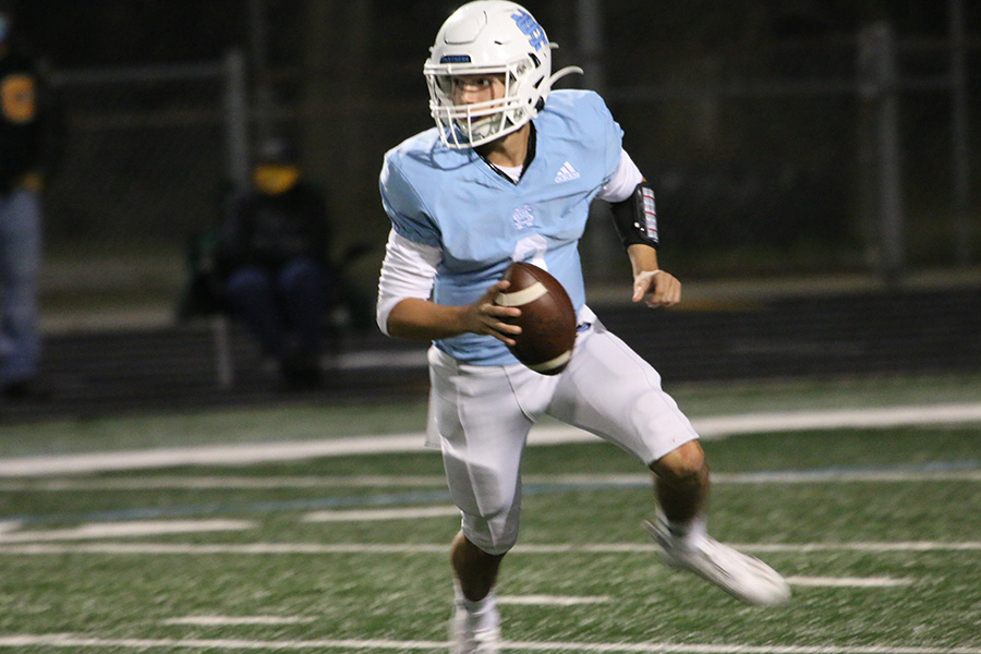 Sophomore+quarterback+Will+Yarbrough+makes+his+way+downfield+during+the+Panthers%E2%80%99+third+region+game+against+the+Griffin+Bears+at+Panther+Stadium.+Despite+some+struggles%2C+the+Panther+offense+made+some+big+plays%2C+while+the+defense+kept+Griffin+in+check+to+culminate+in+a+21-0+shutout.+Yarbrough+ran+the+ball+five+times+for+71+yards+and+two+touchdowns.+For+only+the+second+time+this+season%2C+and+first+time+in+region+play%2C+the+Panthers+scored+21+or+more+points.+