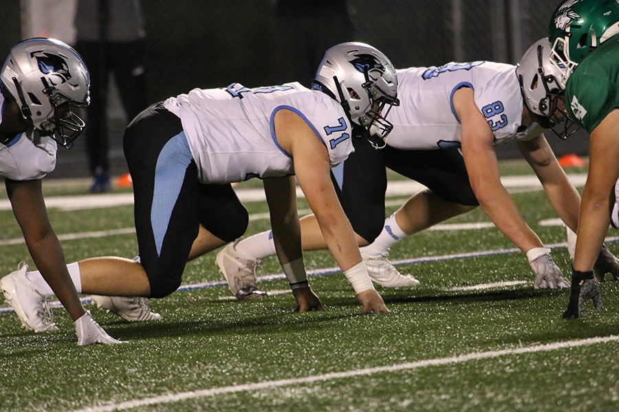 Senior Andres Moc lines up for the next snap during Panther football’s final regular season game against the McIntosh Chiefs at McIntosh High School. Starr’s Mill focused on developing their offensive game amidst great performances by a reliable running back and an explosive defensive line. Moc led the Panther defense with two sacks against the Chiefs in the 38-7 victory.