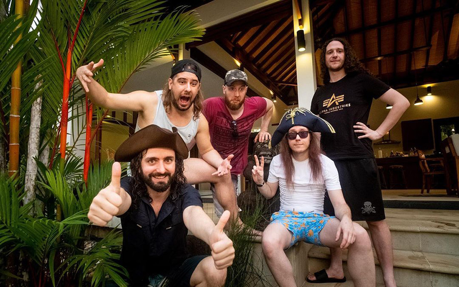 Alestorm band members (left to right), vocalist Cristopher Bowes, guitarist Máté Bodor, drummer Peter Alcorn, keyboardist Elliot Vernon, and bassist Gareth Murdock, pose for a photo. With the rising popularity of sea shanties, I recommend this song for those that are hankering for some more cool music of this nature.