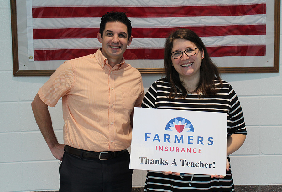 Timothy Monihan poses with this month’s Golden Apple award winner, math teacher and girls basketball coach Emily Sweeney. The standout factor to Sweeney’s teaching is how she goes about her interactions with students. 