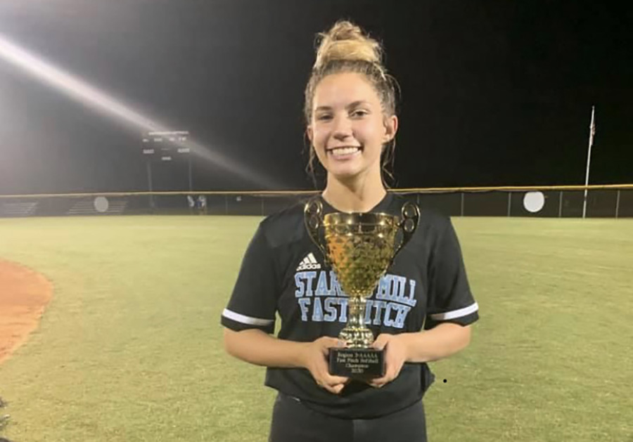 Junior+Ashley+Sikes+poses+with+the+2020+Region+2-AAAAA+championship+trophy.+While+being+known+for+her+long-running+softball+passion%2C+her+heart+lies+with+giving+back+to+a+more+healthful+community.