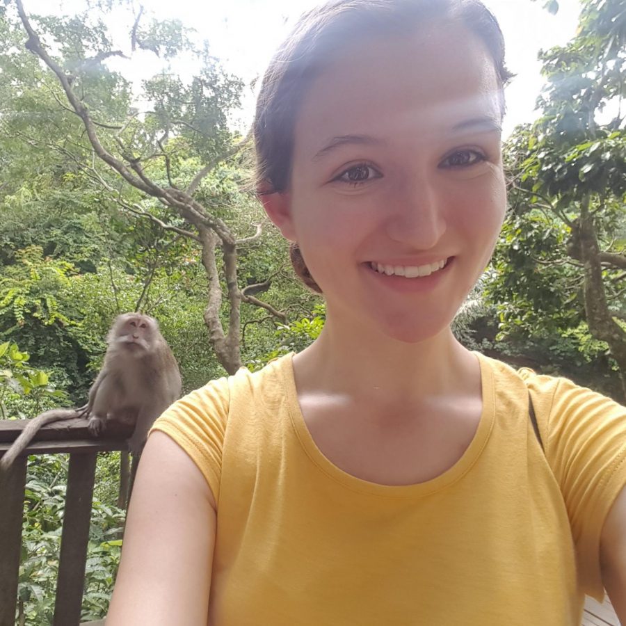 Alumnae Morgan Knowlton, class of 2016, pictured in Indonesia with a monkey in the background. Knowlton graduates from Georgia Tech this year and has been honored as the sole representative of Georgia Tech to represent the system’s “highest scholastic ideals.”