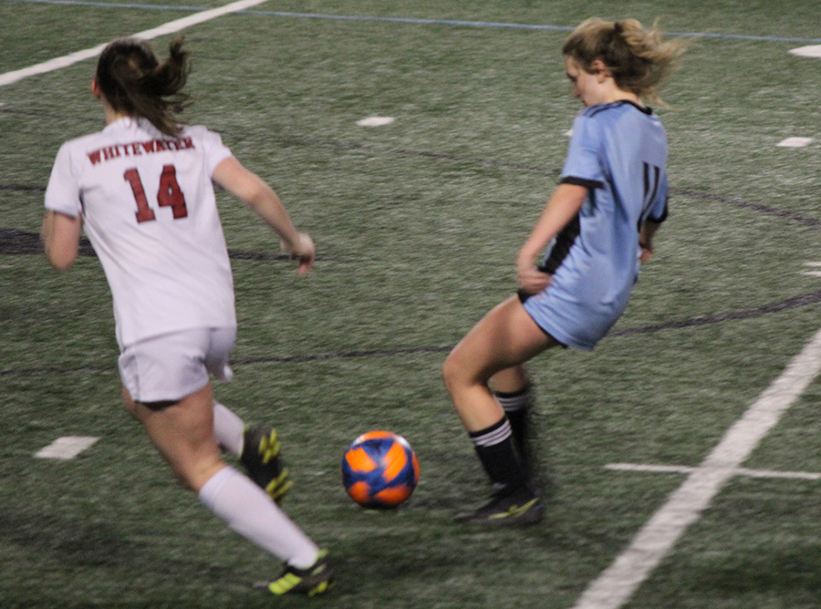 Senior midfielder Darby Olive dribbles the ball downfield. The Lady Panthers capitalized on their newfound momentum to dominate Whitewater on both sides of the ball. Five different players scored either a goal or an assist. Olive scored a goal off of an assist from senior Chloe Thompson with 10 minutes to go in the first half.