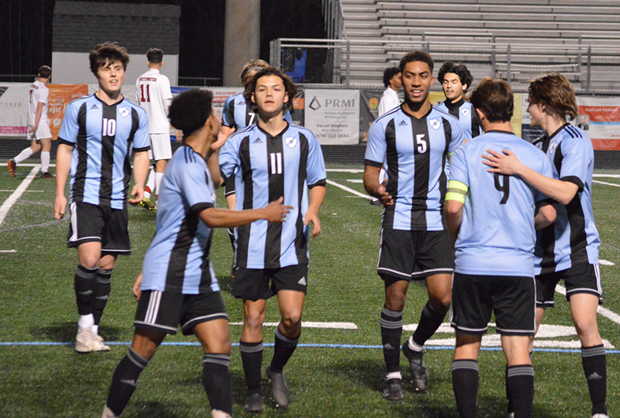 The Starr’s Mill boys soccer team celebrates with senior captain Brooklyn Muccillo following a goal during their game against the Whitewater Wildcats. Both soccer teams defeated Whitewater convincingly, the girls winning 6-2 and the boys winning 8-1. Muccillo scored four goals against Whitewater. “It all stems in training,” Muccillo said. “We know that we’re not doing the stuff off the field for no reason, and then when we do what we do, it translates into that game and it works out.”