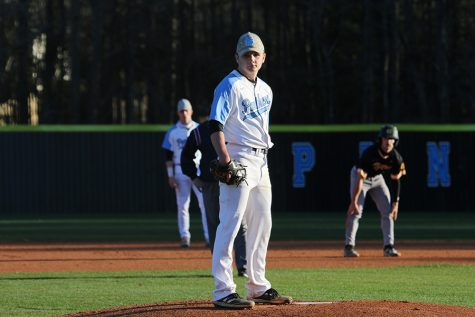 Senior pitcher Daniel Courtney stands on the mound during the Panthers’ region opener against the Harris County Tigers. Courtney provided the jolt Starr’s Mill needed to take down the Tigers 5-1. Courtney only allowed four hits and threw five strikeouts against Harris County. “We just got to build off of this [win] and continue to play like we can,” Courtney said. “Continue to play in the region, just keep it up, and keep winning.”