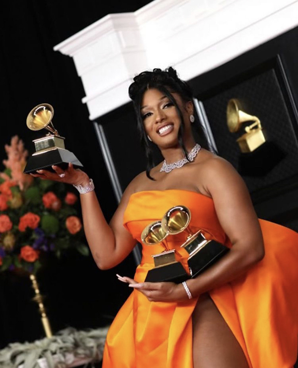 Megan Thee Stallion poses with her three Grammys for Best New Artist, Best Rap Performance, and Best Rap Song. The 63rd annual Grammy awards show featured countless talented performers along with many artists who made history. 