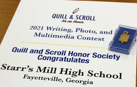 Quill and Scroll is an international organization that acknowledges high school scholastic journalists. Starr’s Mill students Emily Davis, Abby Carter, and Rachel Laposka won Sweepstakes first place, third place, and an honorable mention, respectively. 