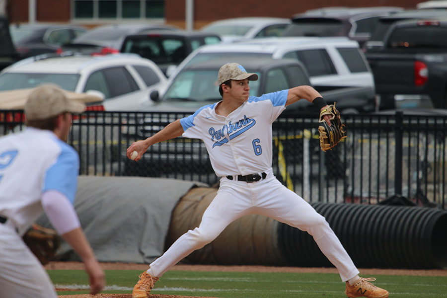 Senior+Chay+Yeager+delivers+a+pitch.+Yeager+recorded+10+strikeouts+while+giving+up+six+hits+and+one+walk+in+the+team%E2%80%99s+win+over+McIntosh.+Seniors+Daniel+Courtney+and+Thad+Ector+both+hit+home+runs+in+the+4-2+victory.