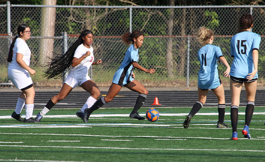 Senior forward Sara Evans evades Creekside during the Lady Panthers’ game against the Creekside Lady Tigers in the first round of the AAAAA state playoffs. Starr’s Mill struck fast and furiously, ultimately ending in a mercy rule victory 10-0. Evans led the team in goals with four. She will be playing soccer at the University of San Diego next year.
