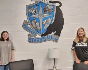 STAR student Kaitly Doyle (left) poses next to STAR teacher Dr. Bonnie Stanford (right). Doyle earned this award for having the highest SAT score and being in the top 10% of her class. She chose Dr. Stanford as her STAR teacher because of the experiences in her creative writing class. 