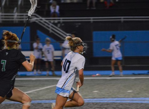 Senior Jacqueline Broderick evades a McIntosh defender and carries the ball up the field into the attacking zone. Broderick forced five of McIntosh’s 20 turnovers as Starr’s Mill defeated the Chiefs 7-3 for the area championship.