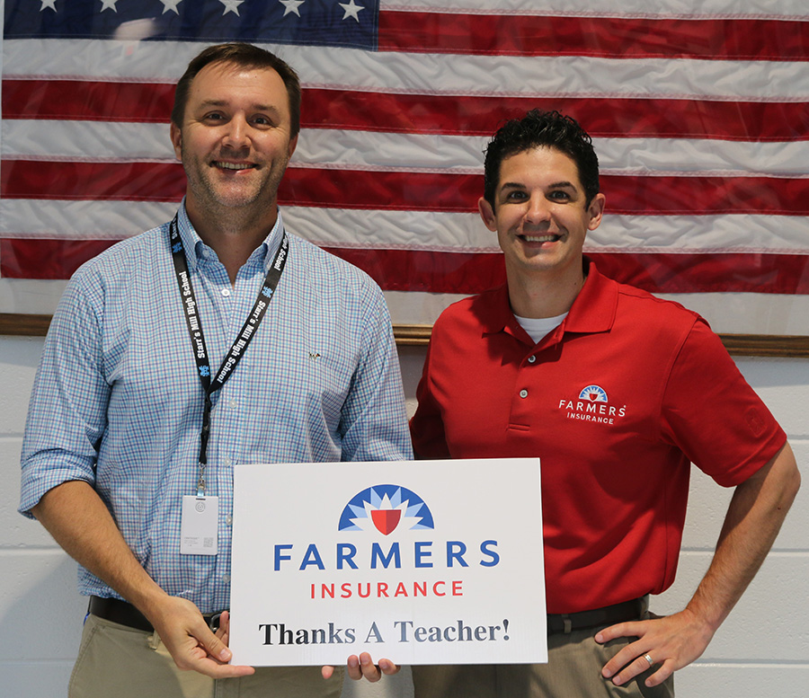 This month’s Golden Apple recipient J.B Campbell with Farmers Insurance sponsor Tim Monahan. Campbell was chosen for his ability to challenge students.