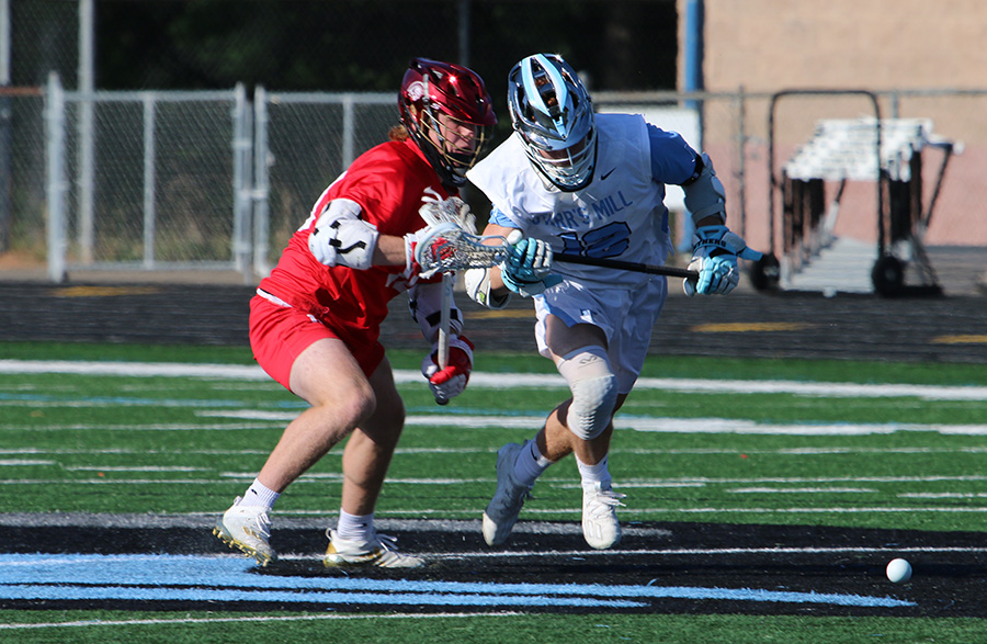 Junior midfielder Nate Mitchell and an opposing Spartan fight for a loose ground ball during the Panthers’ quarterfinal game against Greater Atlanta Christian. The Panthers’ explosive season came to an end on Friday against the visiting Spartans in a 6-4 loss. Ground balls proved to be fatal for Starr’s Mill, as the team had 11 turnovers against the Spartans. In comparison, the Spartans only had six turnovers.