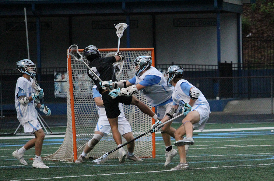 Panthers crowd King’s Ridge senior midfielder and attacker Brennan Brown during the second round of the A-AAAAA GHSA state playoffs. Despite a slow start, Starr’s Mill erupted to dominate the Tigers in a 17-8 victory. Eight players scored for the Panthers and nine players collected ground balls. “Nobody thought that we could win without those [seniors] that left last year,” Schmidlkofer said. “These guys have proven that they can. I’m super, super proud of all the guys that are contributing.”