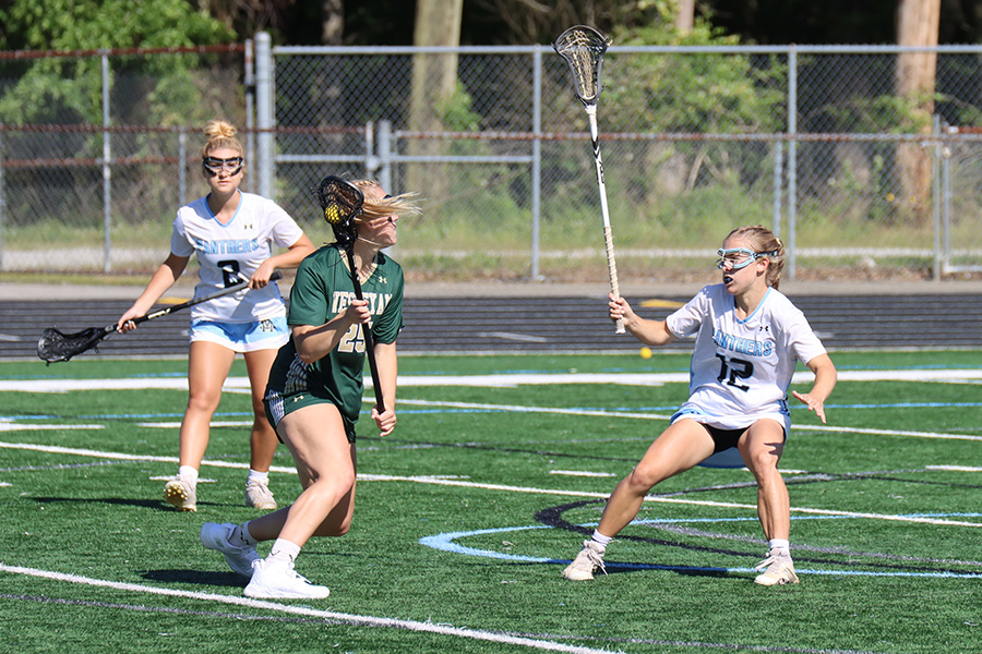 Senior Lauren Flanders locks off a Wesleyan attacker in the state quarterfinals. Flanders tallied one goal, three caused turnovers, and two draw controls. The Panthers won 16-10 and advances to the GHSA A-AAAAA semifinals for the third straight year.