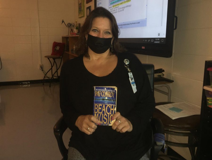 English teacher Tara Burnette is re-reading “Beach Music by Pat Conroy. The book follows a father character and his journey through his past. 