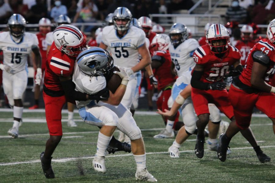 Sandy Creek senior Josh Walker tackles Starr’s Mill player. The Panthers took another hit in a 37-16 loss to the Patriots. Starr’s Mill has experienced four diverse outcomes in the four games leading up to region play.