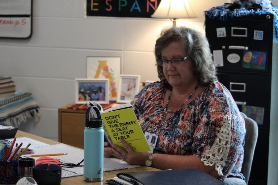 Spanish teacher Laura Alldredge read “Dont give the enemy a seat at your table by Louie Giglio. The book discusses not allowing negative thoughts like fear, insecurity, and anxiety to get into one’s mind. 
