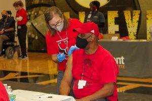 Fayette County teachers and school staff receive the Covid-19 vaccine. The Board of Education will draw from the ESSER II program to give teachers bonuses for doing so.