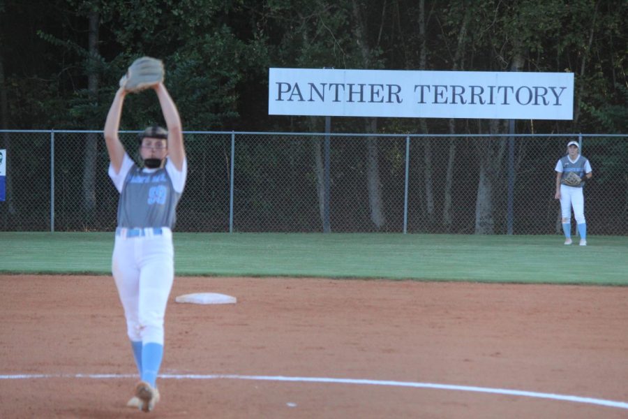 Senior+pitcher+Lili+Backes+prepares+to+throw+a+pitch+as+senior+outfielder+Sydney+Blair+watches.+The+Lady+Panthers+swept+Jackson+County+7-0%2C+5-2+in+round+two+of+the+GHSA+state+playoffs.