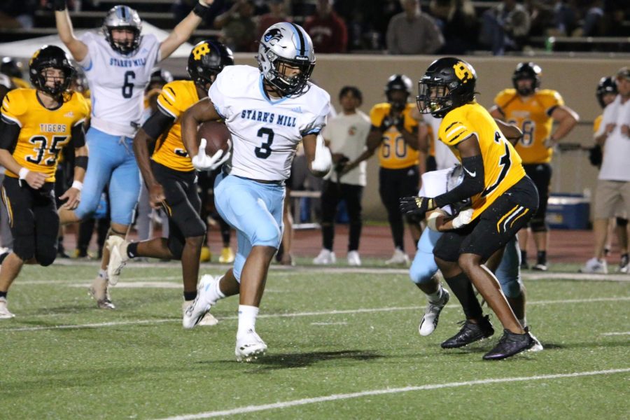 Senior running back Brandon Mathis rushes for a touchdown with tight end senior Barrette Schmidlkofer cheering. Starr’s Mill won 42-20 against Harris County this past Friday. “We finally played up to our capabilities. I’m just proud of the boys. [They] kept plugging away and kept working hard, what we asked them to do, all the position meetings, all the film study, all that early morning and afternoons,” head coach Chad Phillips said. “If you keep doing that it’s going to pay off for you. You play by far our best game this season, by far.”