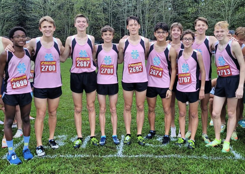 Varsity boys pose at the Coach Wood International race. They placed 22nd in the championship division.  