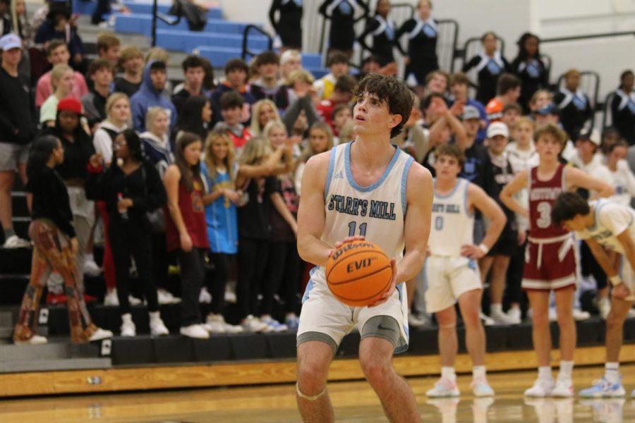 Senior Evan Courvile prepares to shoot a free throw. Starr’s Mill hosted the Tip-Off Classic by Adidas and went up against Midtown in the final game of the night. The Knights capitalized on a slow third quarter by the Panthers, winning 66-46. “Midtown was a good team [athletically],” head coach Joshua Reeves said. “I think they caused us to change a lot of the shots we wanted, and because of that we couldn’t finish very well.” 