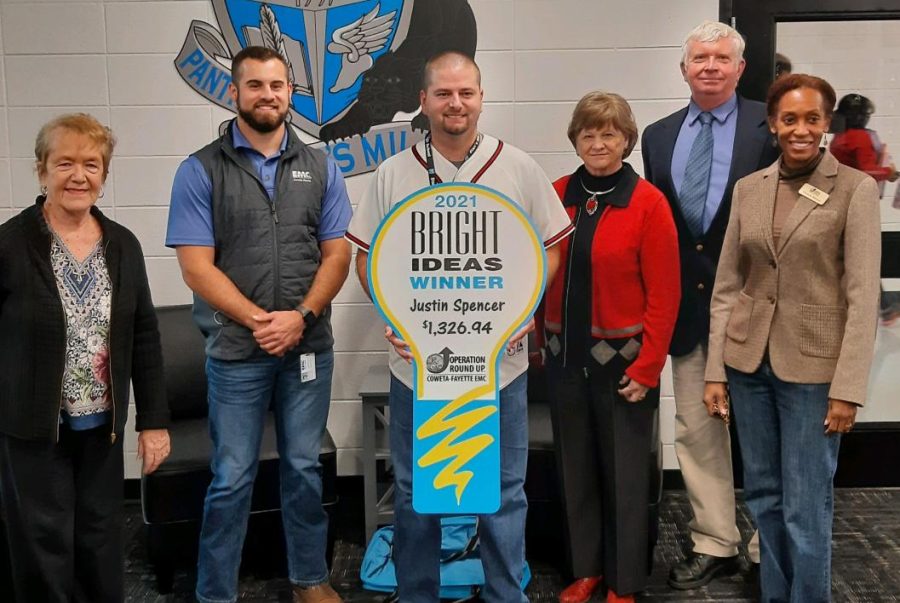 Bright Ideas grant recipient Justin Spencer poses for a photo with representatives from the Coweta-Fayette Trust, Inc. This is the second time in three years that The Prowler has earned the award.