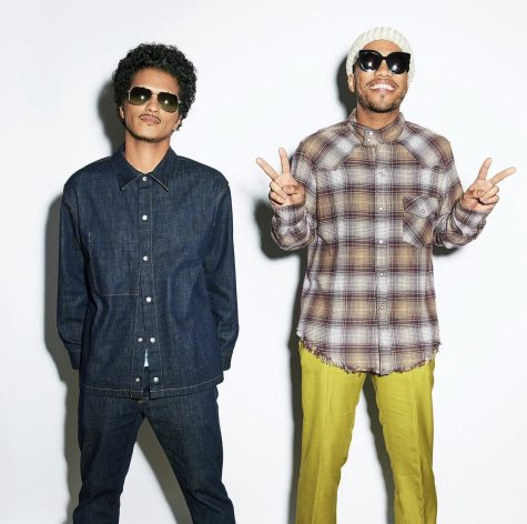 On November 12, Bruno Mars and Anderson Paak released their new album “An evening with Silk Sonic.” The album is in the R&B/soul genre and features artists Thundercat and Boosty Collins.
