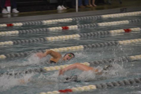 Sophomore Emma Frank races against a McIntosh swimmer in the 200-yard freestyle. Frank qualified for the GHSA State Championship and placed 1st in the event. 
