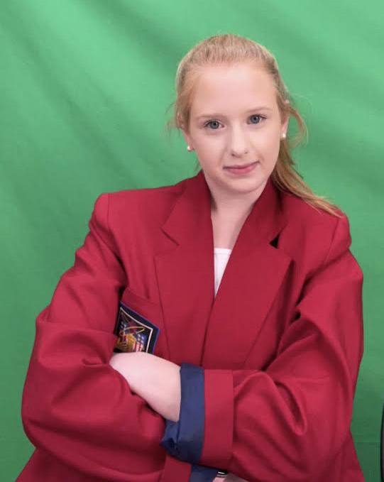 Senior Madison Prince after her virtual interview, donning the SkillsUSA official wear. Prince placed second in the Job Interview category and will move on to the state round.