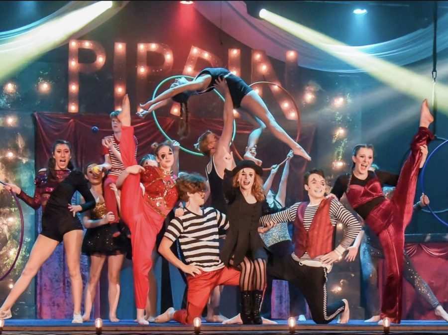 The cast of “Pippin” pose onstage. For their annual musical, the Starr’s Mill drama department chose “Pippin,” a performance that showcases musical talent as well as circus and silk aerobic acts and includes the audience at every possible moment.