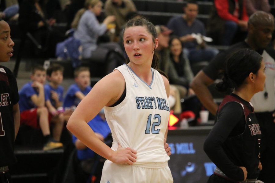 Sophomore Sunny McQuade awaits a teammate’s free throw attempt. After multiple attempts to close the gap and capitalize over Whitewater’s lead, the Starr’s Mill Lady Panthers lost 62-52. Despite back-to-back baskets during the third quarter, the team’s slow energy hindered their ability to get a leg up over the Wildcats’ lead.