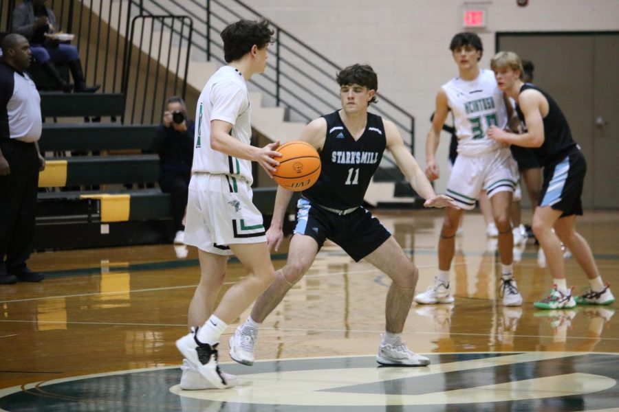 Seniors Evan Courville and Philip Schultheis on defense against McIntosh players. Starr’s Mill, the No. 7 seed in the region, played McIntosh, the No. 2 seed, in the opening round of the region tournament hosted at Griffin High School. McIntosh ended the Panther season with a 35-33 win.