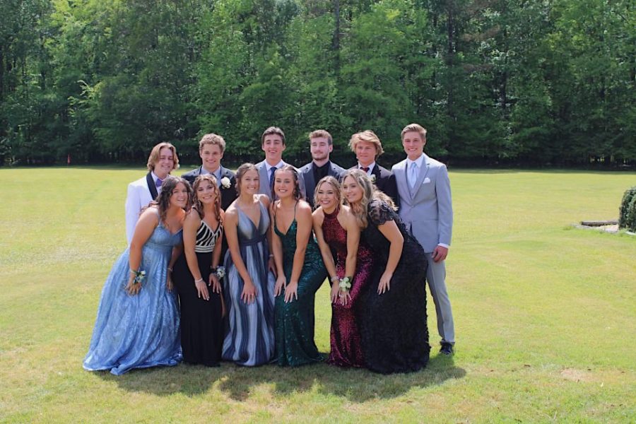Members of the Class of 2021 pose for a photo prior to attending prom. This year, Starr’s Mill will hold prom at Tongue and Groove in Buckhead, Atlanta. With this announcement comes concerns from parents and students regarding the safety and affordability of the location.
