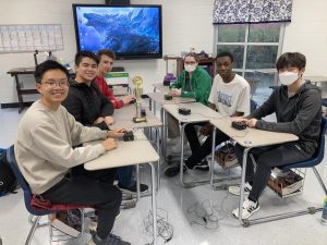 Varsity academic team members pose for a photo. Both varsity and JV teams qualified for the state competition, the first in-person match since before COVID.