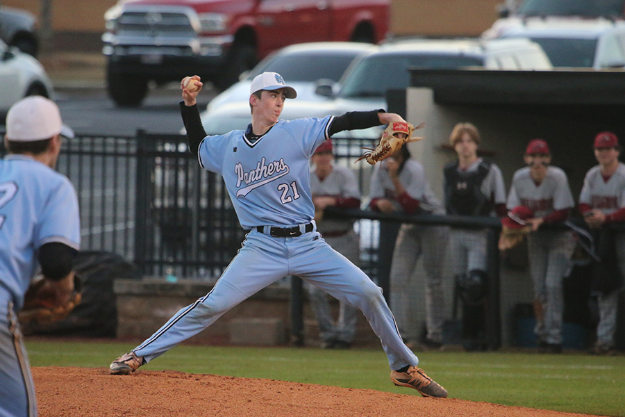 Sophomore pitcher Drew Richardson delivers a pitch. After going against tough competition at the beginning of the season, the Panthers continued the trend and defeated the Hillgrove Hawks, 8-5.
